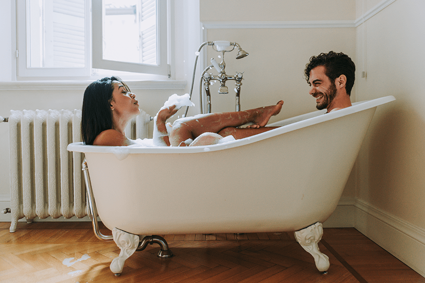 Can CBD Enhance Orgasms? CBD & Sex | image of a couple in a bath