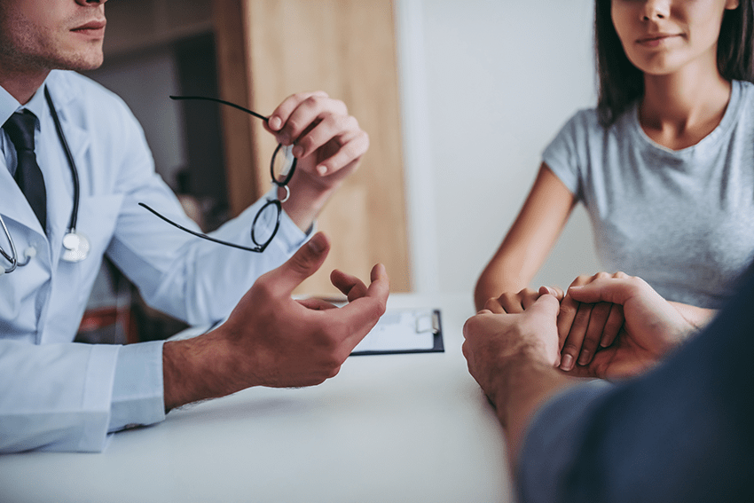 image of a couple consulting with a doctor for the blog about Exploring the Potential of CBD in Enhancing Healthy Relationships