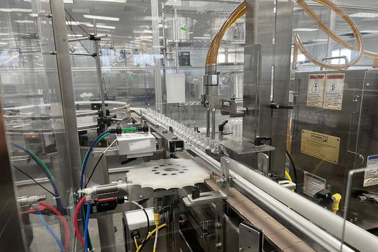 image of the tincture oil filling machine for the blog about 5 Challenges CBD Wholesalers Face in Product Creation