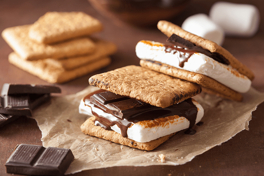 Image of classic s'mores on a table for our blog titled: S'mores Recipe Galore: 3 Delicious Twists on a Classic Treat