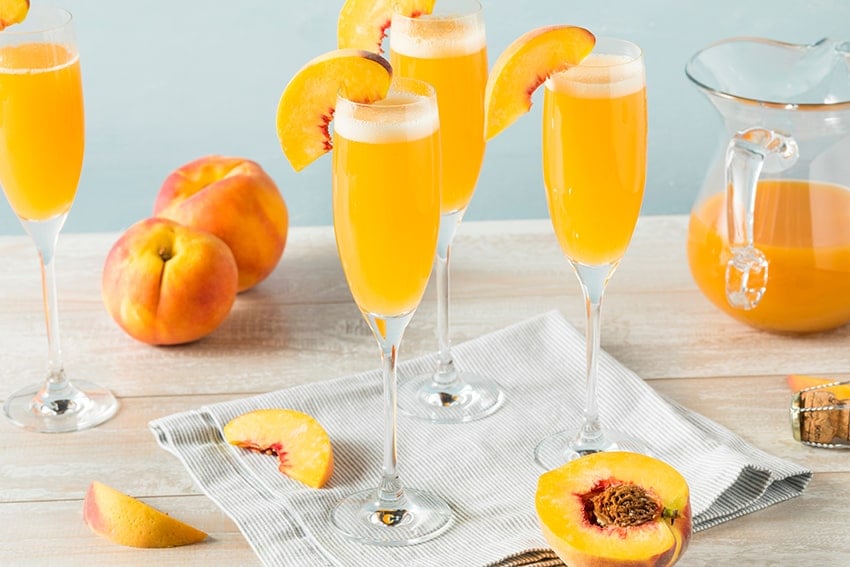 an image of peach bellini mocktails