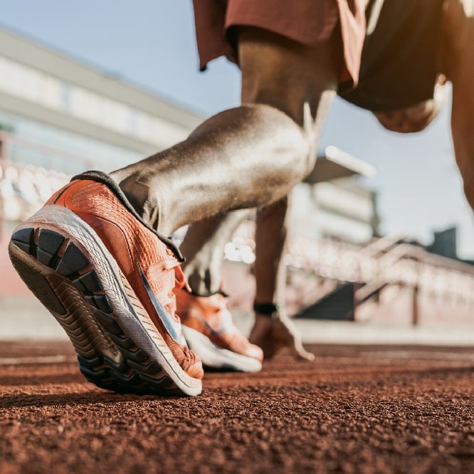 image of runner setting up for a race