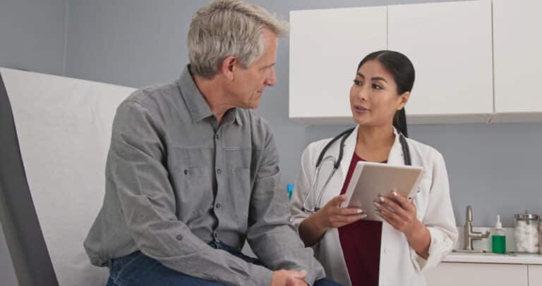Senior patient consulting with physician about Medicare CBD coverage options