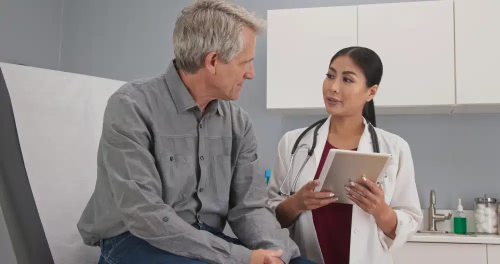 Senior patient consulting with physician about Medicare CBD coverage options